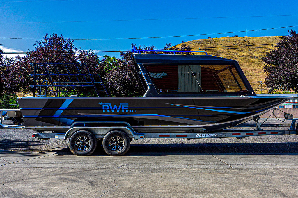 Dynamic Designs Boat Vinyl Wrap on RFW Boats in Blue and Black